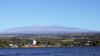 Mauna Kea above Hilo Bay