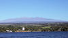 Mauna Kea above Hilo Bay