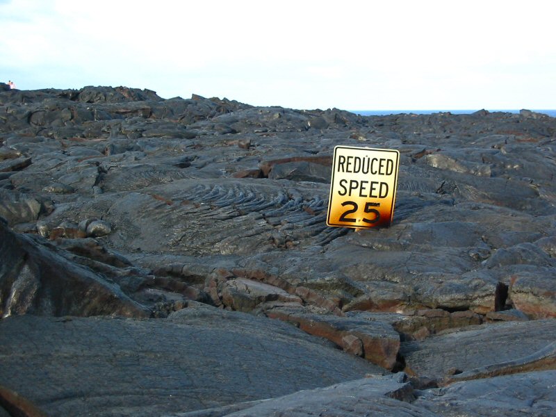 Kilauea lava flow overruns road