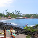 Surfers at Kahaluu Beach Park, Kona