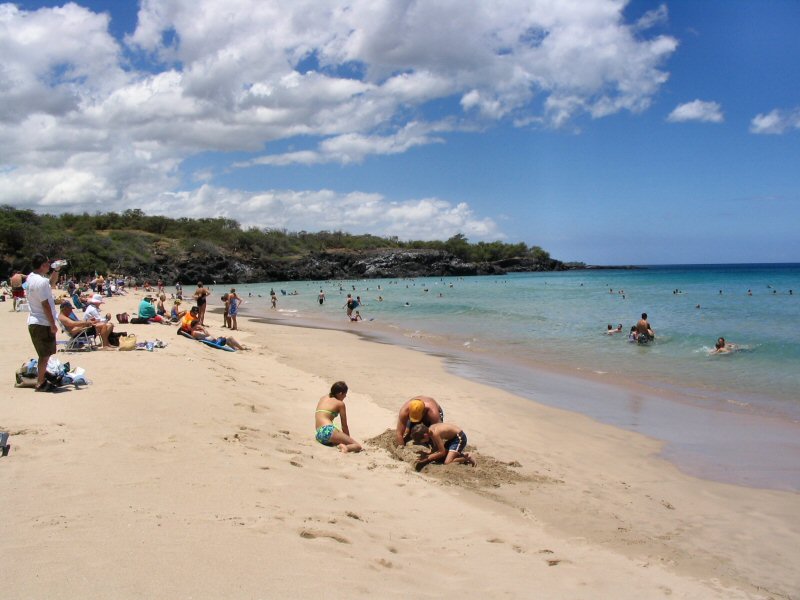 Playing in the sand at Hapuna Beach