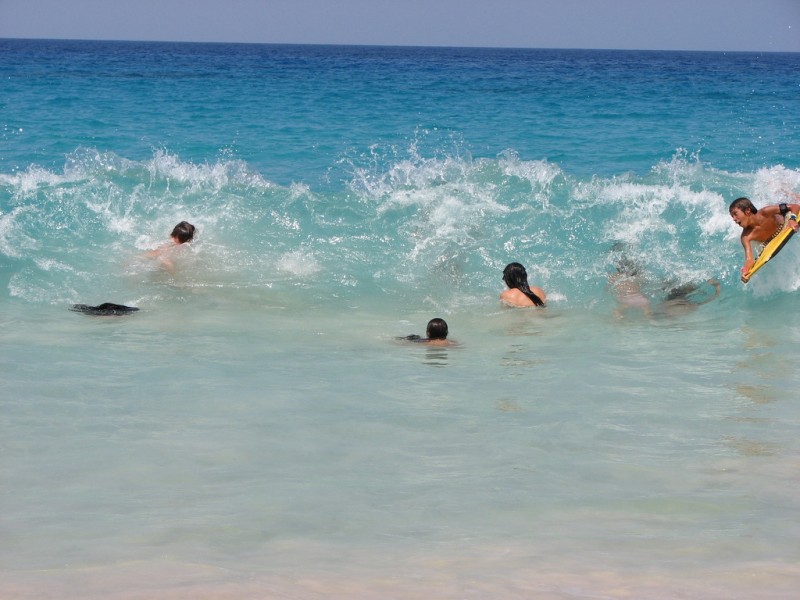 body surfing at magic sands beach